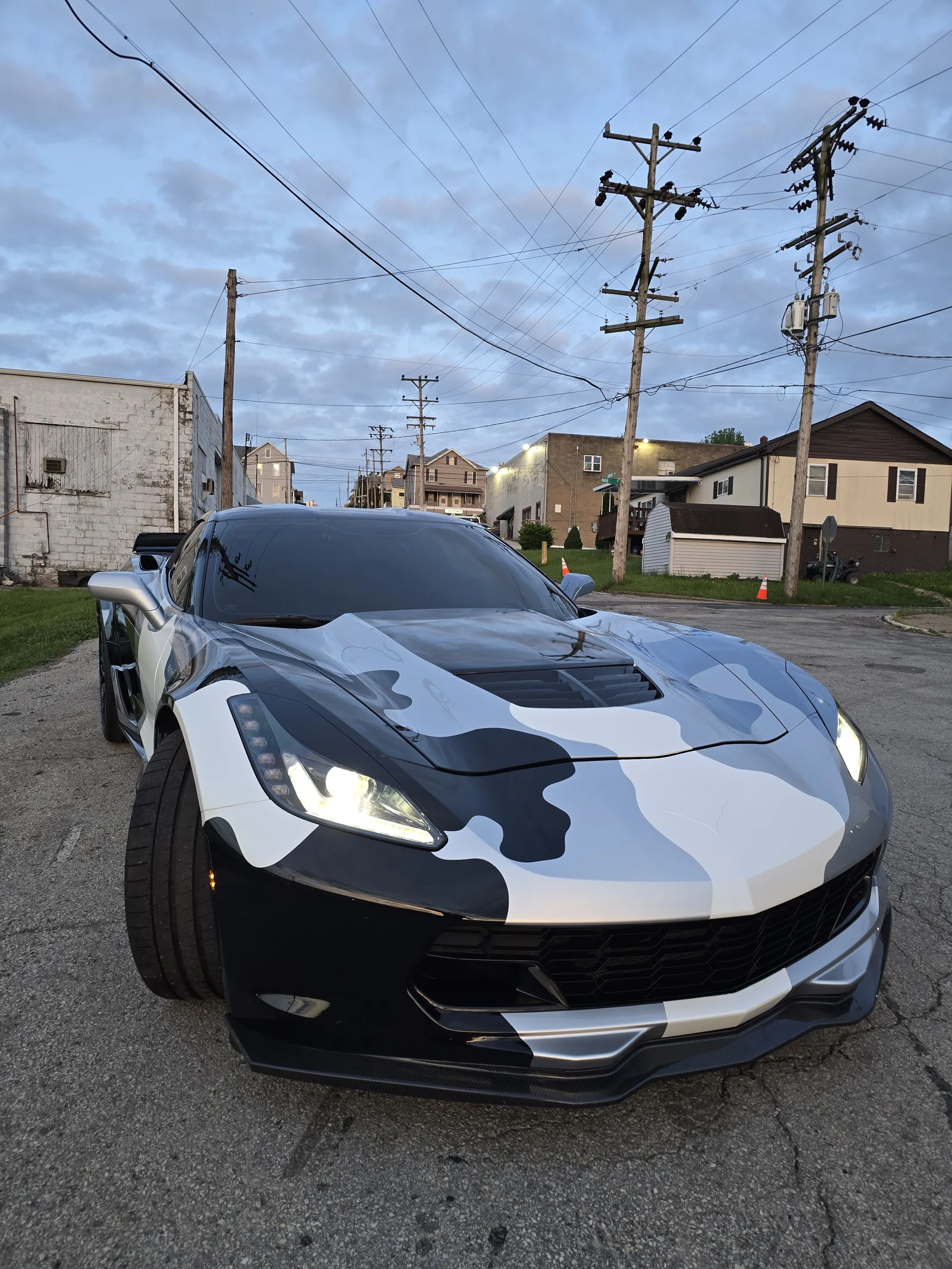 Corvette sports car receiving custom vinyl detailing and paint protection